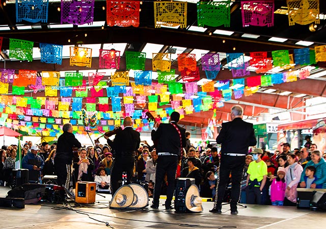 Photo of Mariachi band playing at the Day of the Dead event at the Brick Works.
