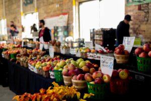 Fruit and vegetables on display at a farmers market.