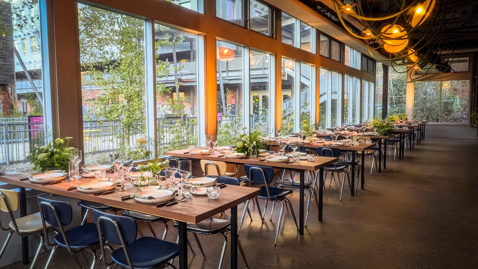 Interior of picnic cafe with tables laid out for private event