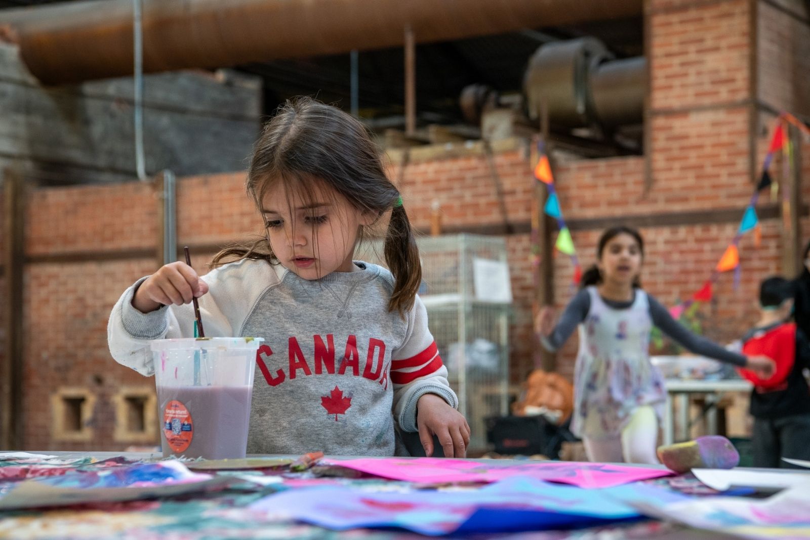 Little girl does a craft