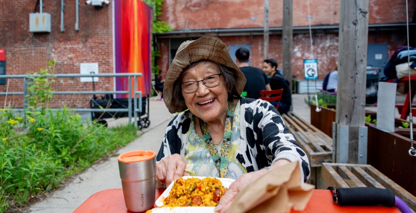 Woman enjoying a summer meal outside