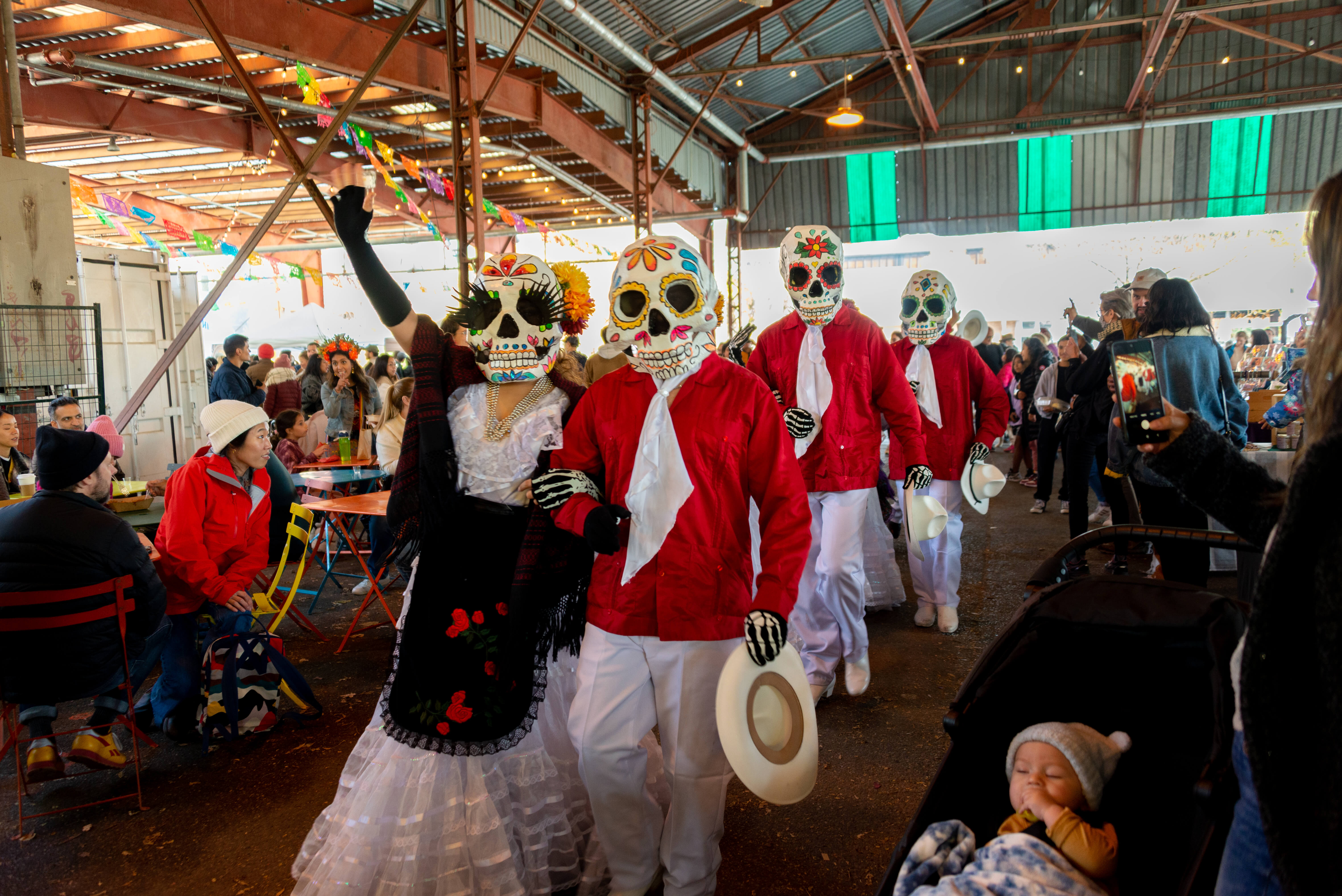 Day of the Dead celebrations at Brick Works with people dancing in costumes