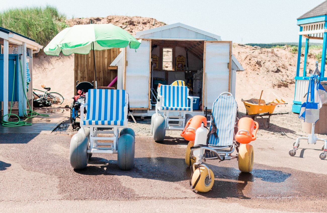 Beach scene showing wheelchair-beach chairs
