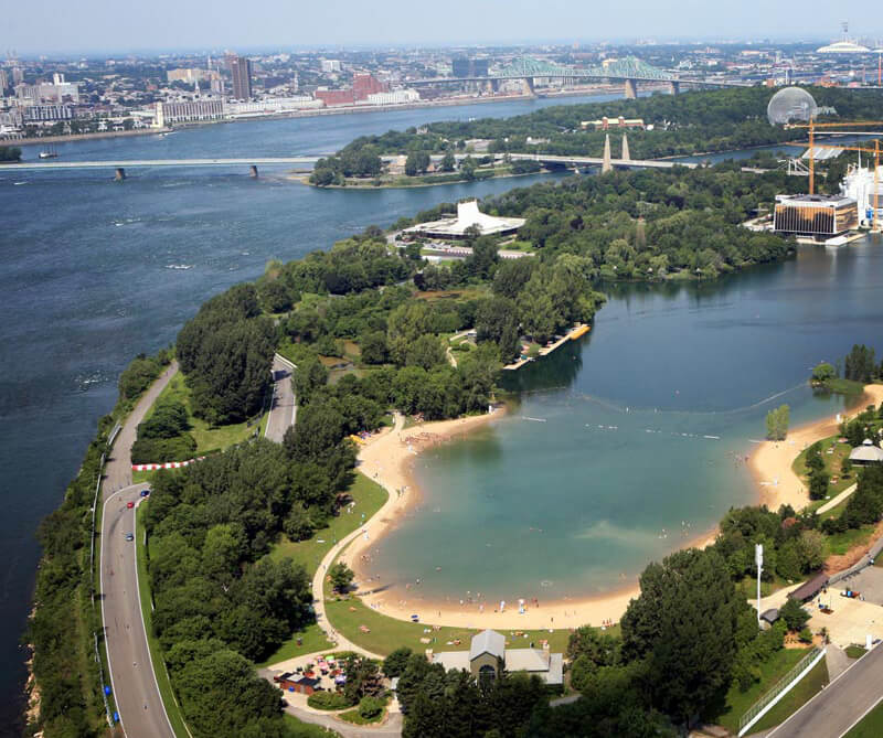 Arial shot of Parc Jean-Drapeau islands with beach and trees.