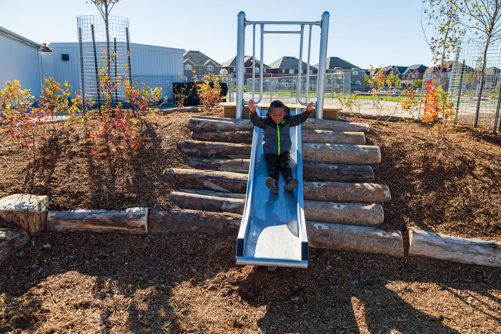 Slide in playground at Irma Coulson public school